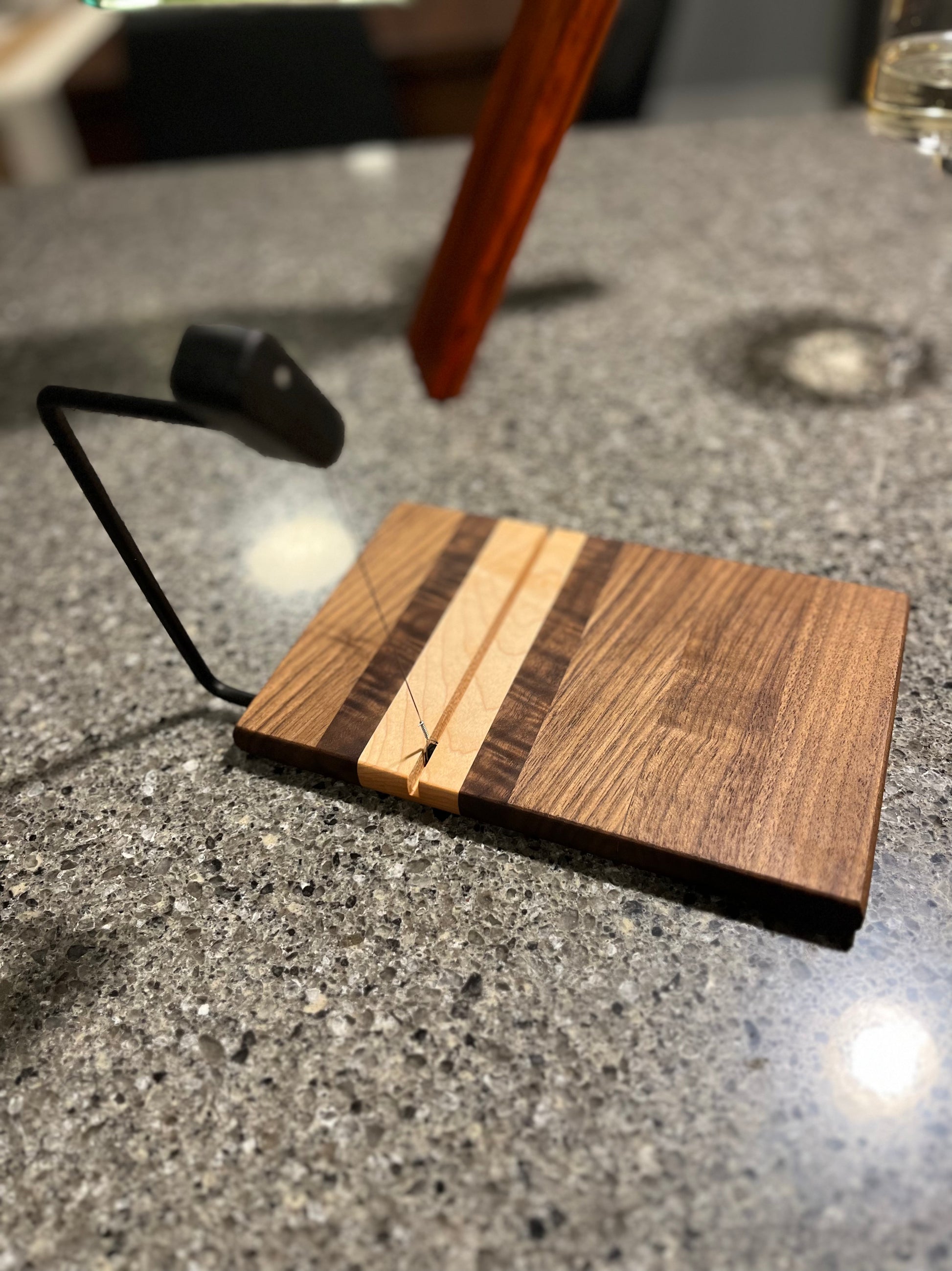 Cheese slicer. Available in cherry , walnut and maple.